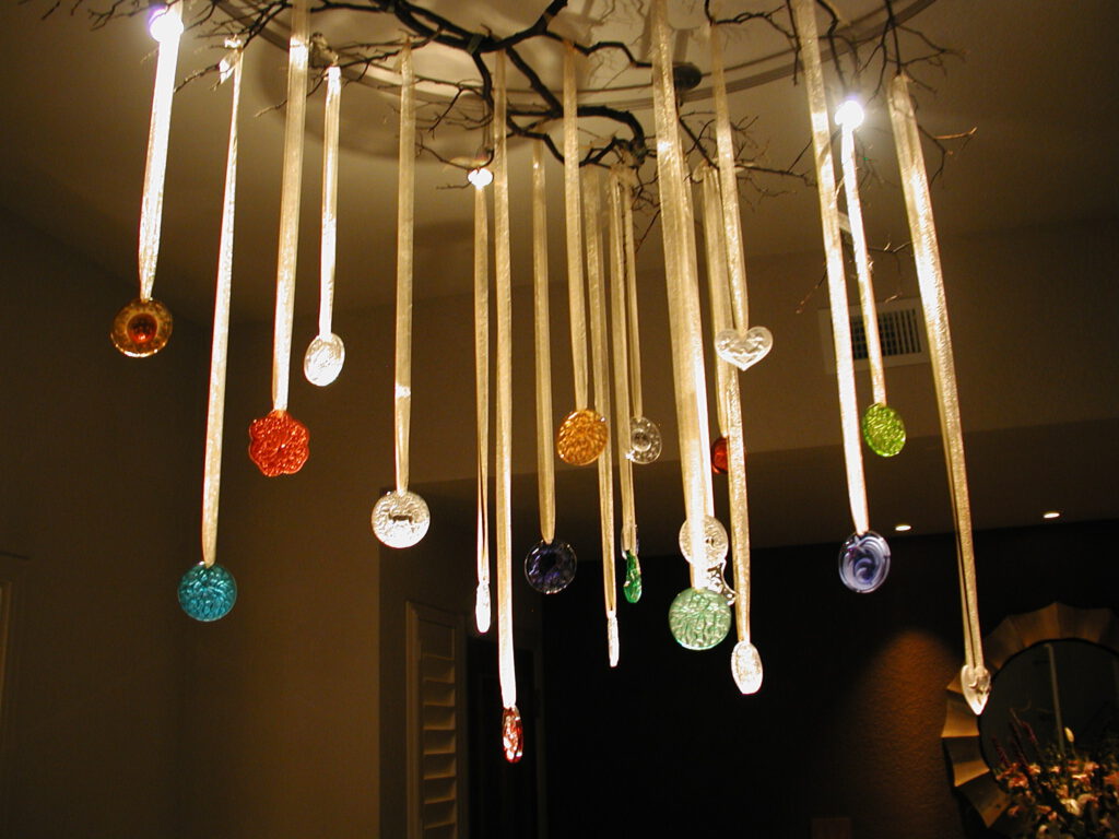 a lighting installation that resembles hanging crystal medallions